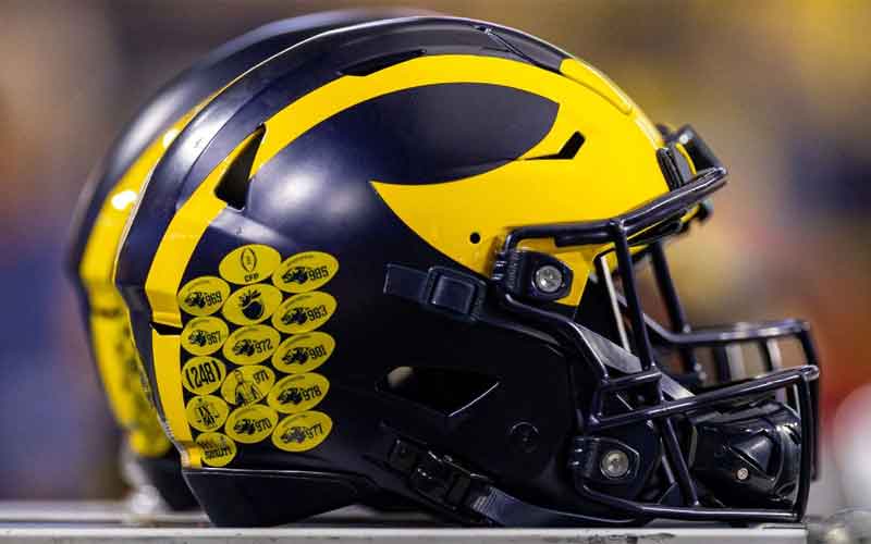 Michigan football hit with 3 years probation, fined