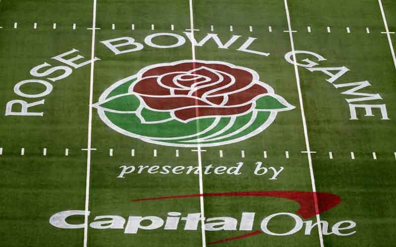 NCAA to allow ads on football fields